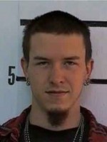 Roy Whistle Young man with dark hair and goatee